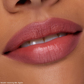 ColourPop pencil being applied to lips demonstrating smooth color and definition