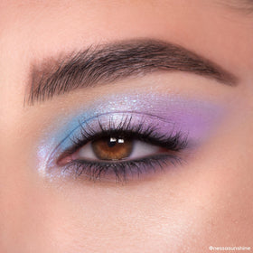ColourPop applied on model eye demonstrating blendable formula and luminous lid finish