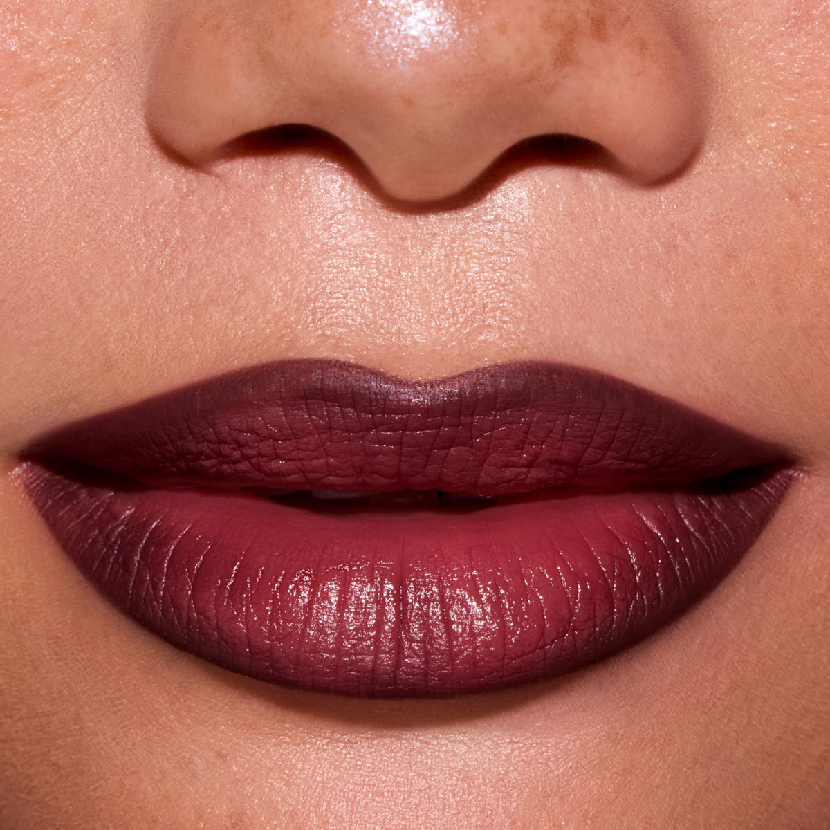 ColourPop New Love on model lips closeup illustrating rich, wearable color