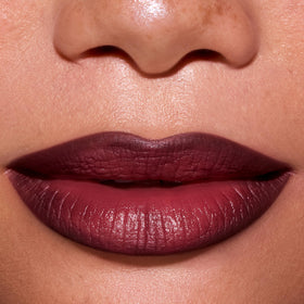 ColourPop New Love on model lips closeup illustrating rich, wearable color