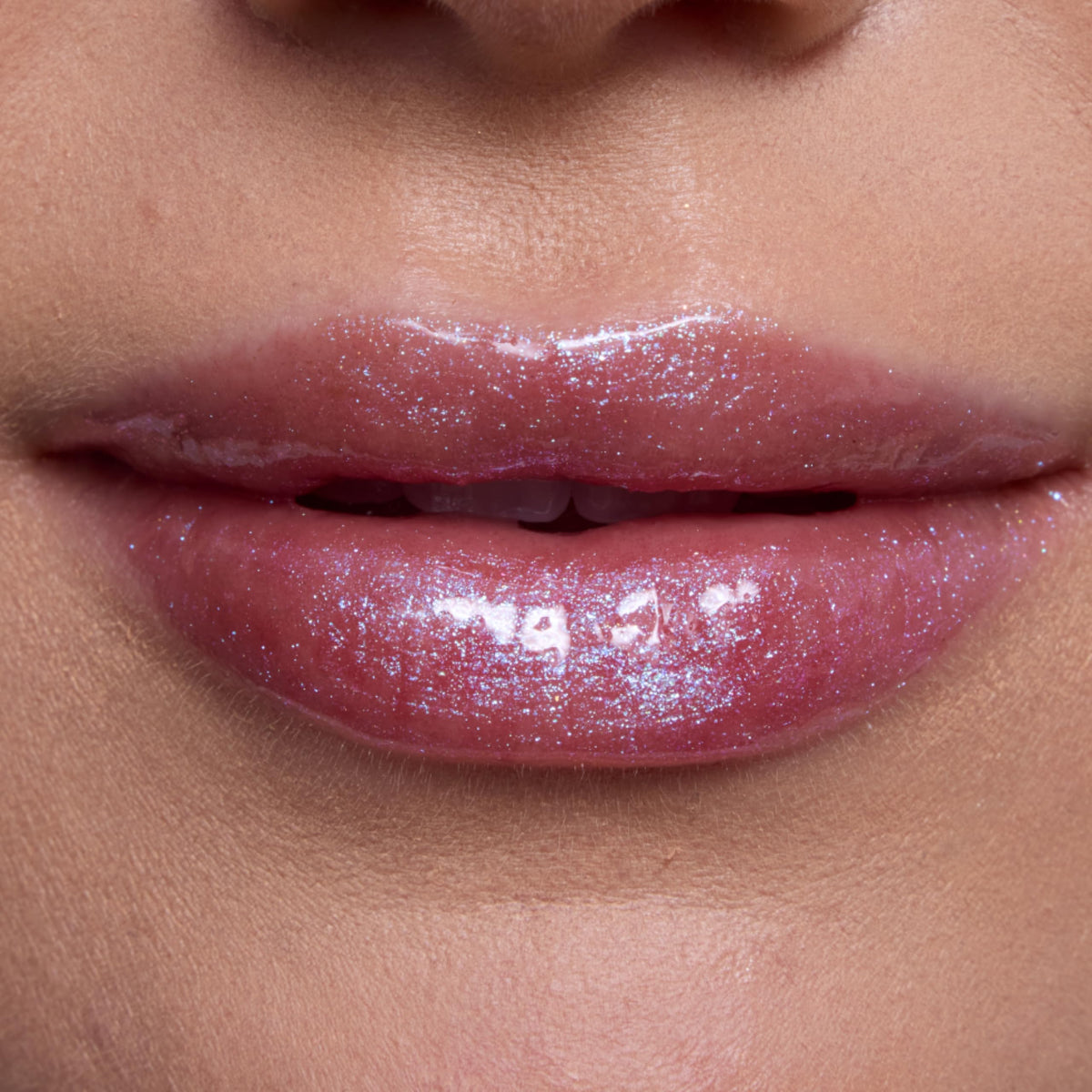 ColourPop Pinky Lilac swatch on arm revealing shimmer and buildable pink-lilac color payoff