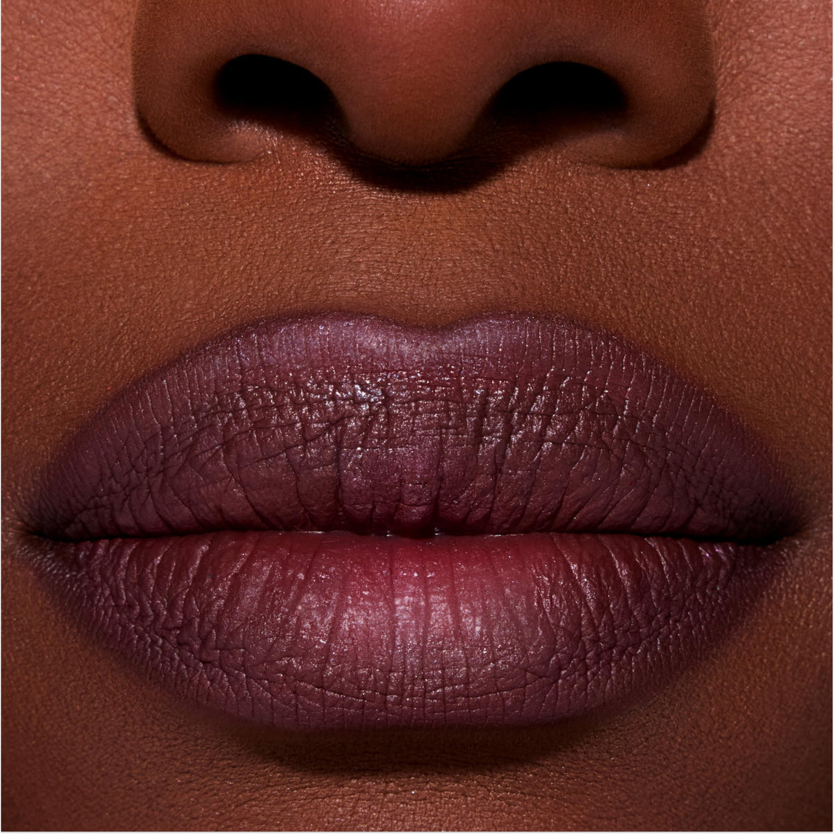 ColourPop shade swatches on arm showing true-to-tube pigmentation