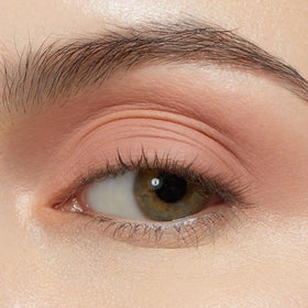 ColourPop Shadow Stix applied on model lid demonstrating instant one-swipe color