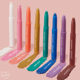 ColourPop Shadow Stix next to a lipstick to show compact size and travel-ready convenience