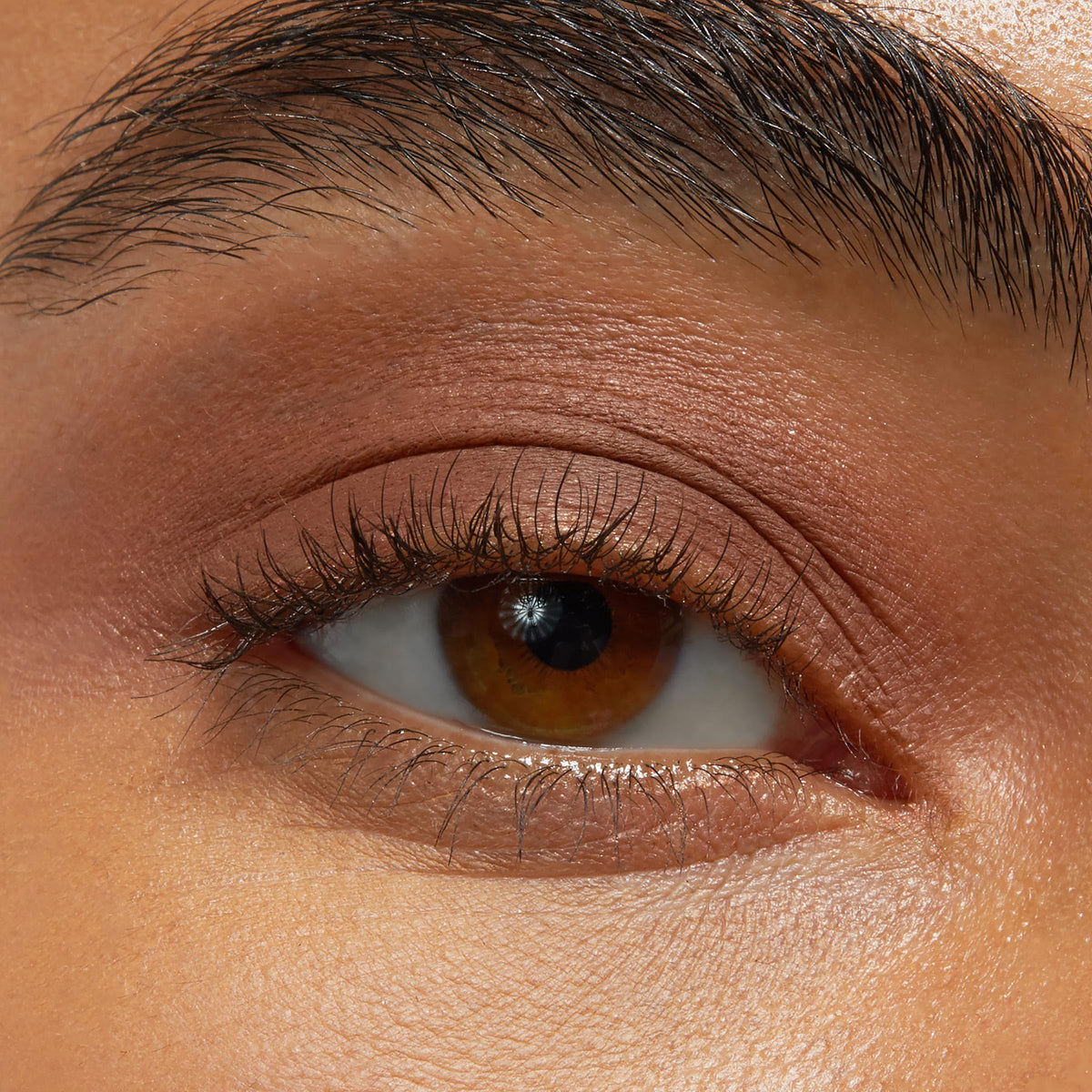 ColourPop Shadow Stix Walnut Ave swatch texture on skin demonstrating creamy, blendable payoff
