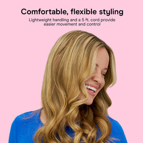 Conair curling iron wrapping a hair section demonstrating effortless styling