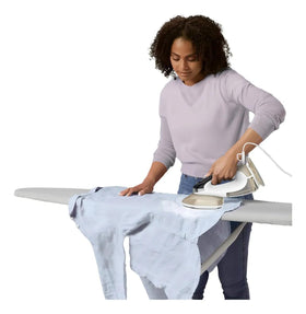 Conair compact unit inside luggage illustrating travel-friendly portability