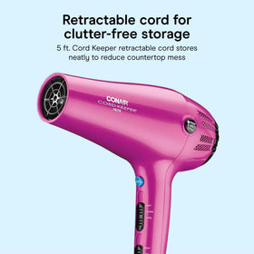 Conair Cord Keeper held in hand to show scale and ergonomic weight advantage