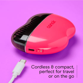 Conair CR80 styled beside travel pouch to show on-the-go convenience