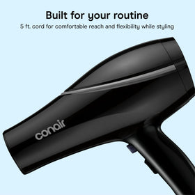 Conair dryer staged in bathroom for travel-ready daily styling convenience