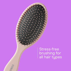 Conair detangler on bathroom counter for convenient daily use