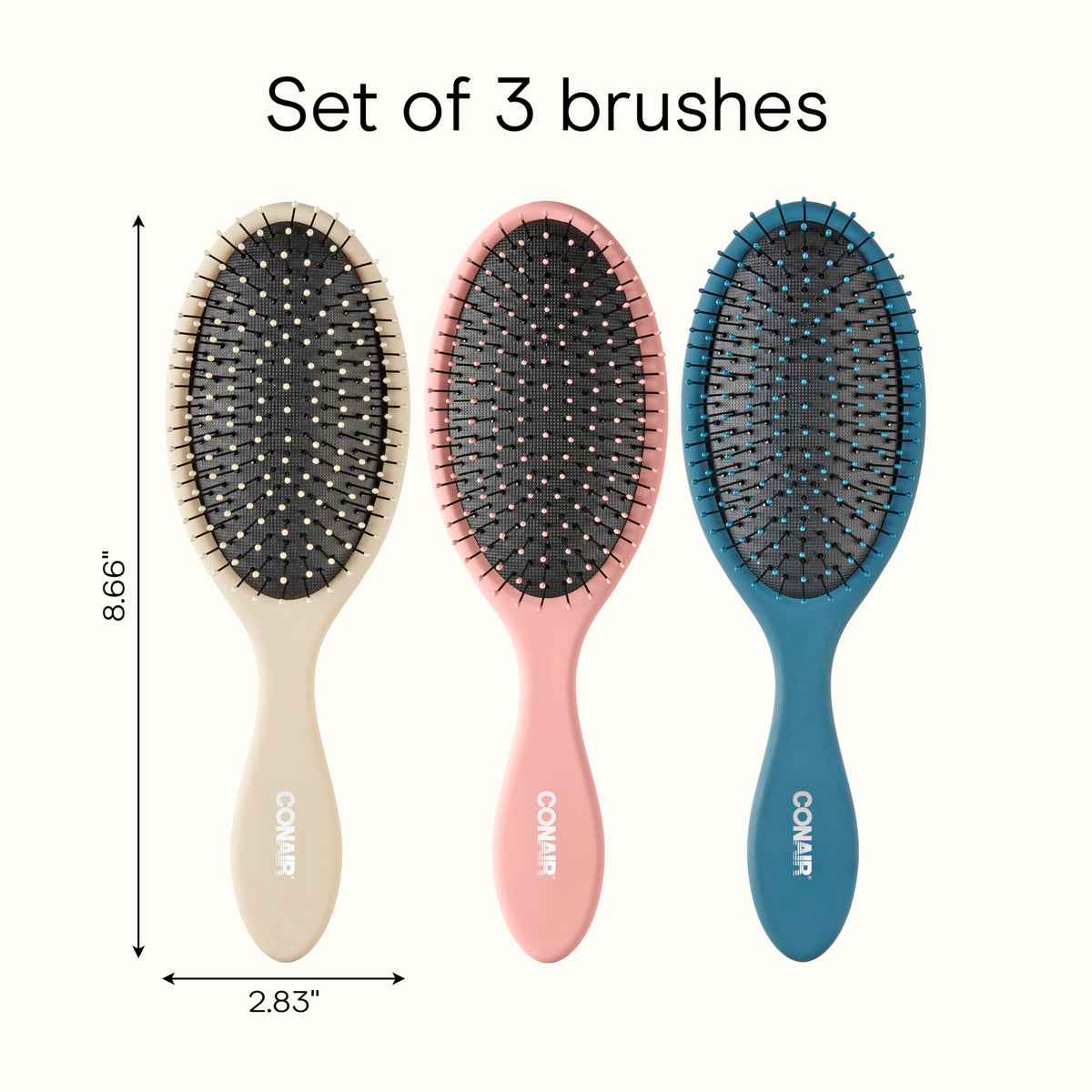 Conair detangler size comparison in hand showing compact, portable design