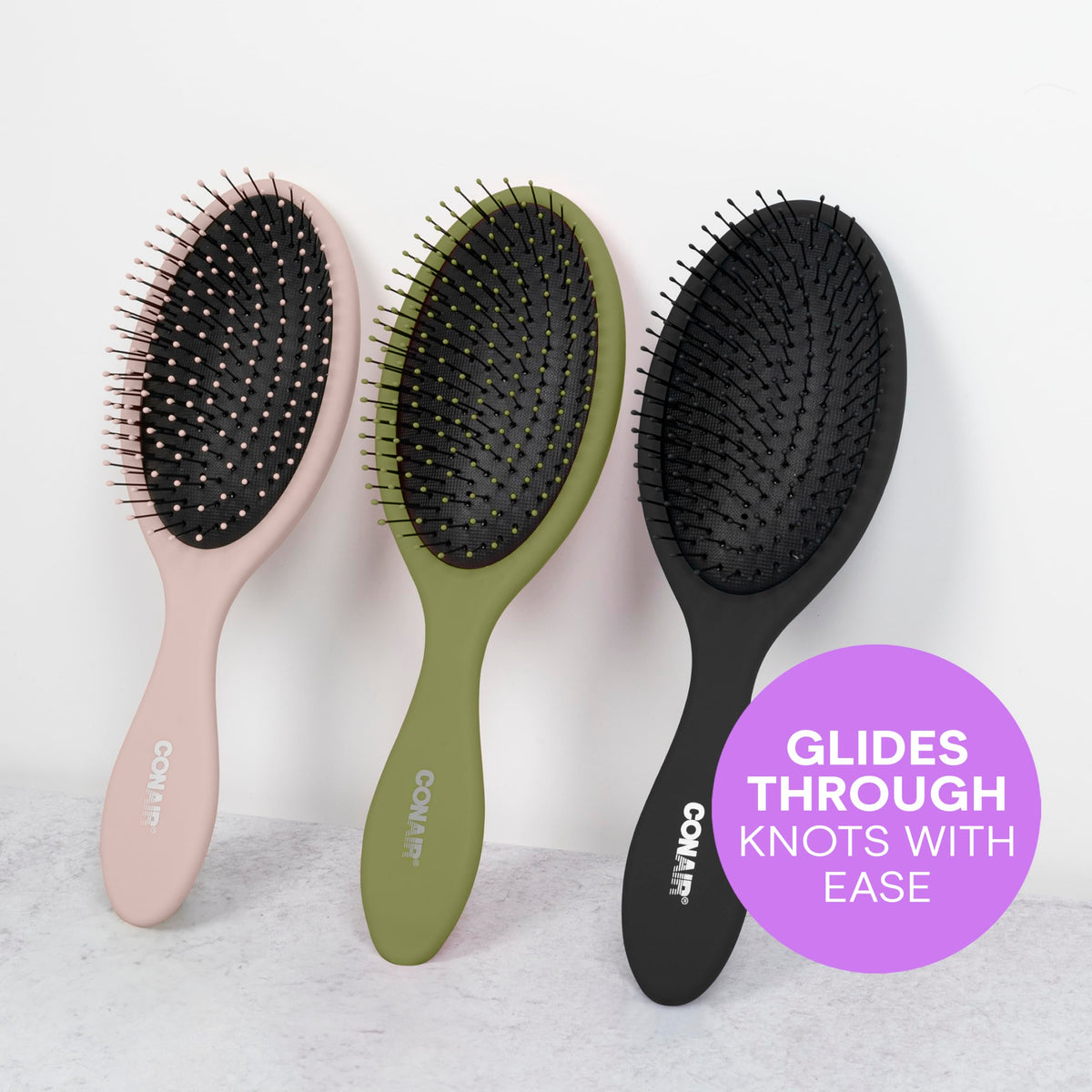 Conair three-color detangling brushes showing versatile color options
