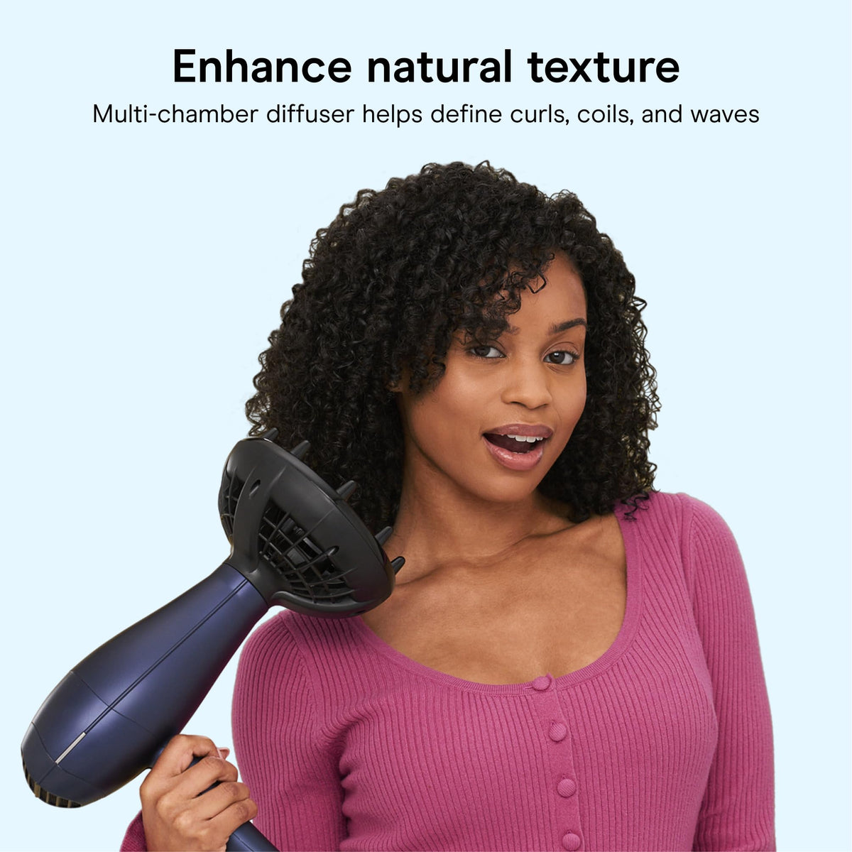 Conair dryer in use on curly hair to define waves and reduce frizz