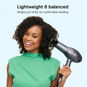 Conair dryer using diffuser on curls to enhance natural texture and reduce frizz