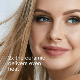 Conair flat iron angled to create soft waves, useful for versatile styling options