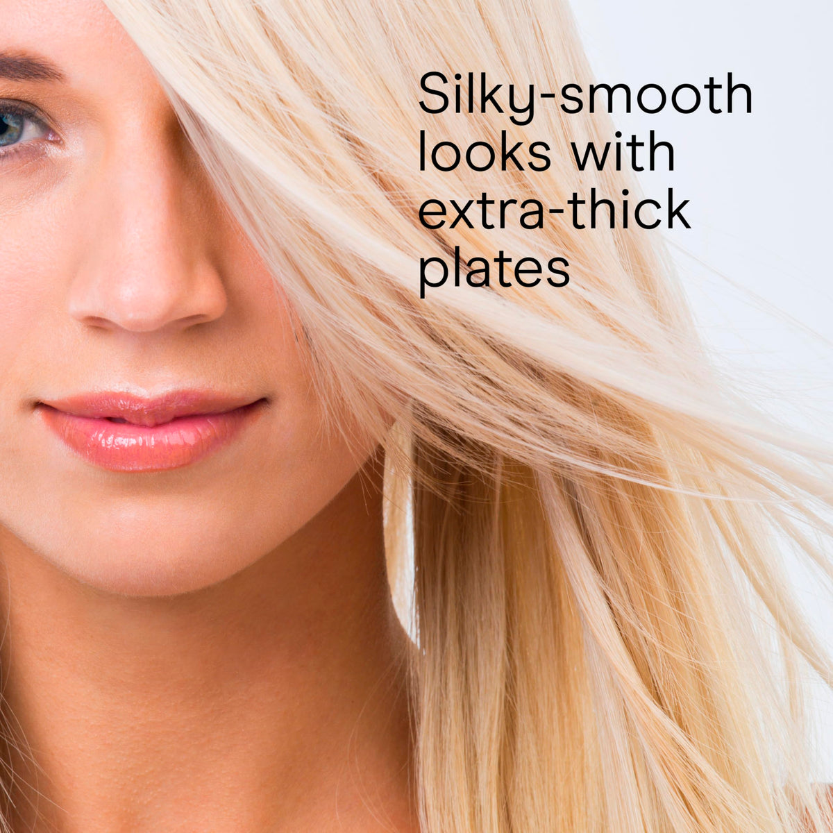 Conair flat iron straightening a long hair section to show wide 1½-inch plates speeding styling