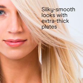 Conair flat iron straightening a long hair section to show wide 1½-inch plates speeding styling