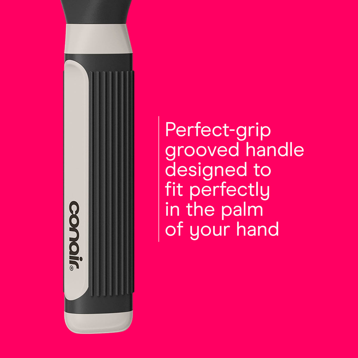Conair brush held in hand showing scale and easy handling benefit