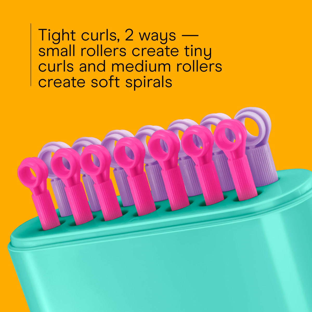 Conair hot rollers wrapped in hair demonstrating secure clip-free hold