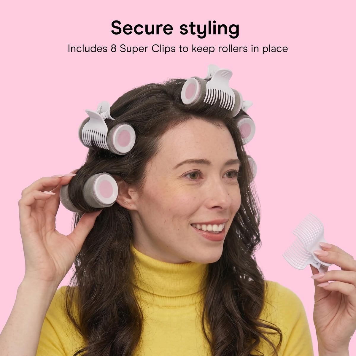 Conair hot rollers being used on hair to create voluminous waves and lift