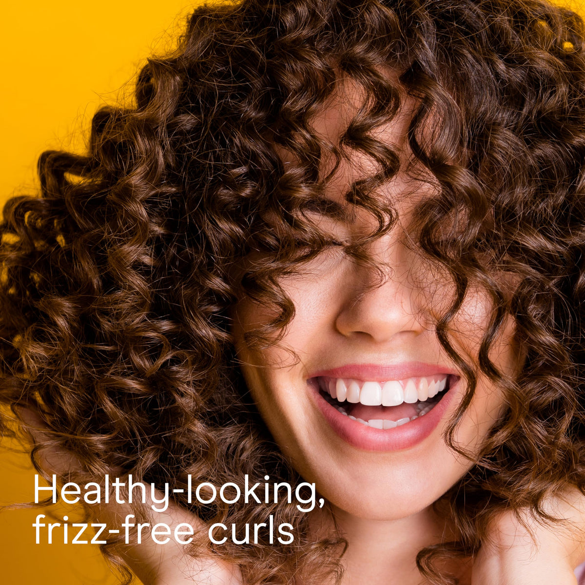 Conair rollers beside ruler showing size options for varied curls