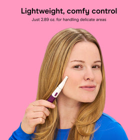 Conair trimmer held in hand to show scale for comfortable control
