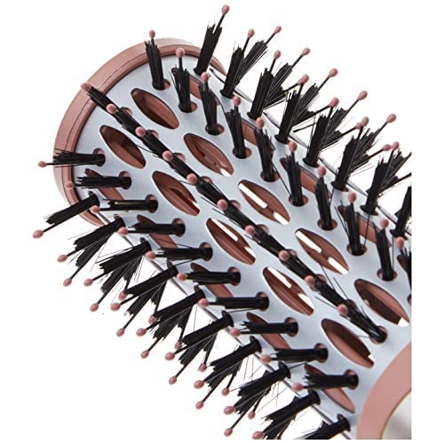 Conair InfinitiPro in use drying and styling damp hair to smooth finish