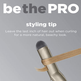 Conair INFINITIPRO curling hair into loose waves demonstrating volume benefit