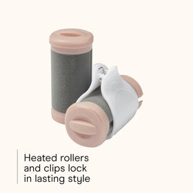 Conair INFINITI PRO rollers in use on model creating smooth beachy waves