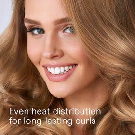 Conair size comparison in hand showing lightweight, ergonomic design