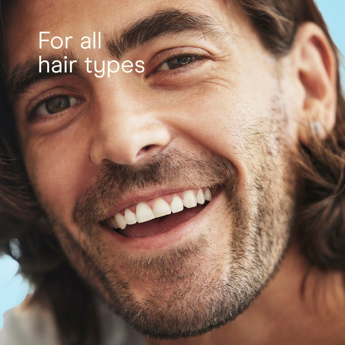 Conair Men brush held in hand to show scale and quick styling convenience