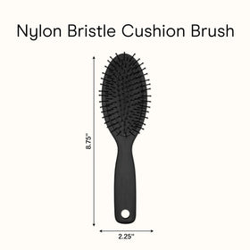 Conair Men brush inside a toiletry bag ready for travel and on-the-go grooming