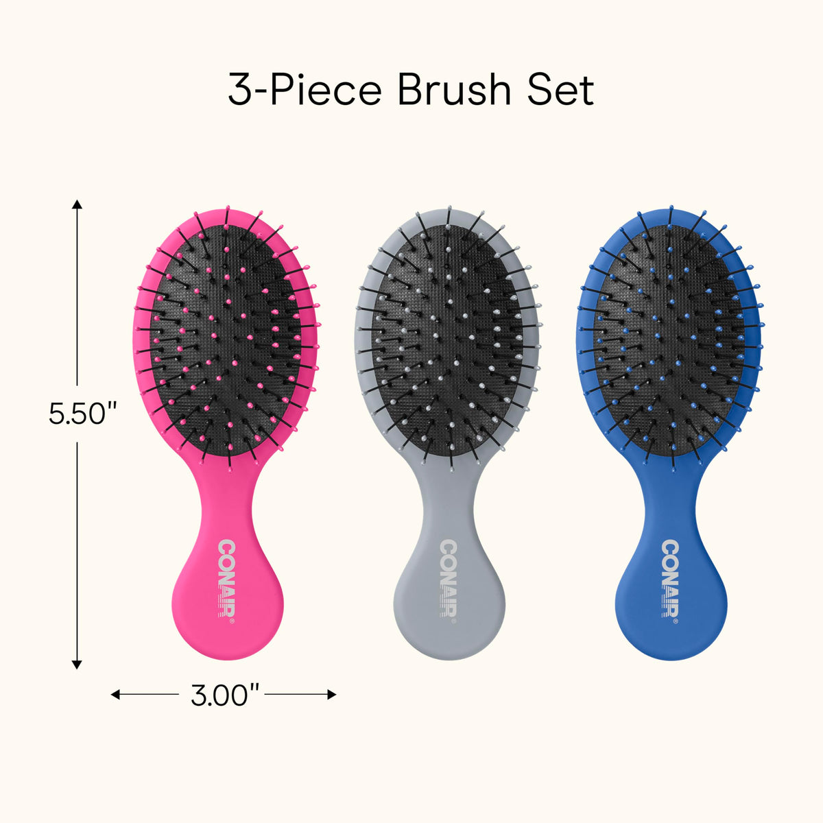 Conair beside coin for scale showing miniature size for purse or travel