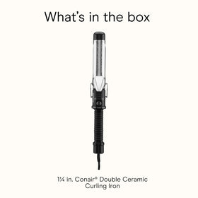 Conair curling iron held in hand to show barrel length and scale benefit