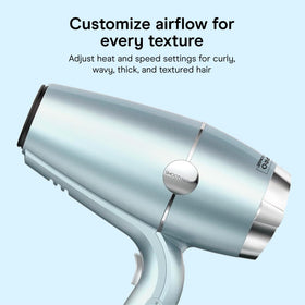 Conair SmoothWrap held in hand for scale, lightweight design reduces arm fatigue