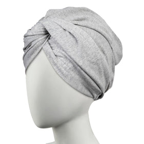 Conair turban front view showing compact gray wrap and easy twist benefit