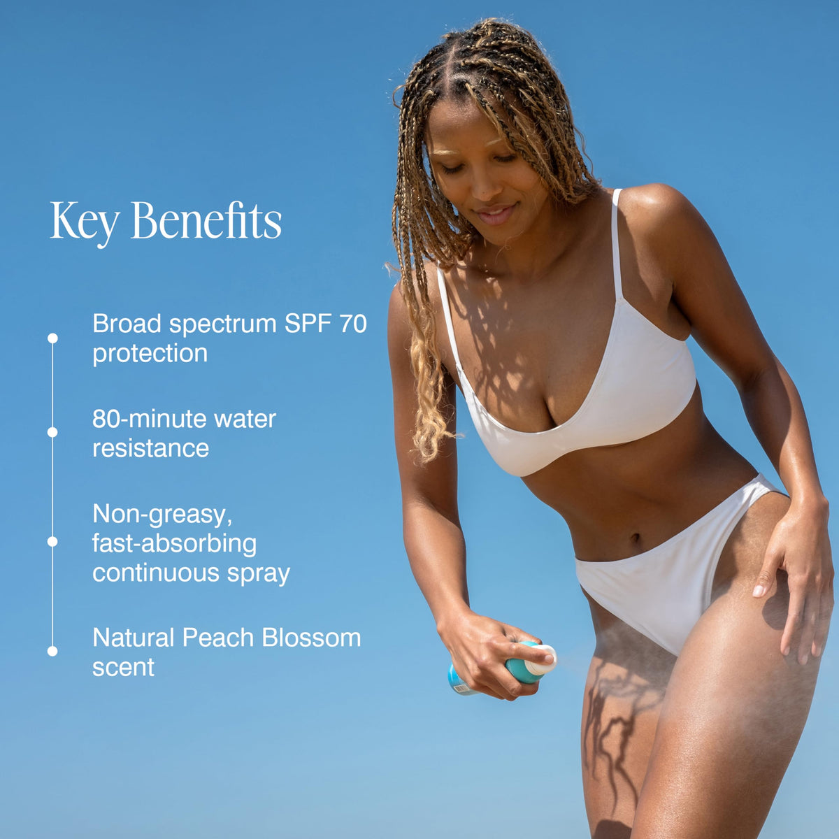 COOLA application on arm showing quick spray and fast-absorbing finish