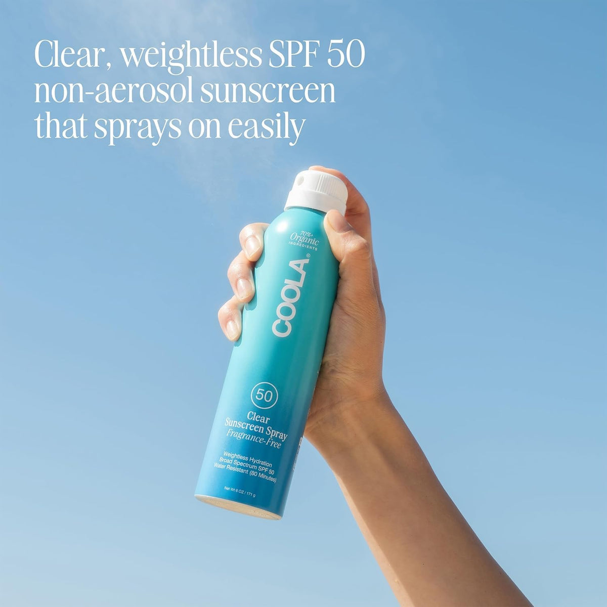 COOLA clear spray texture close-up demonstrating lightweight feel