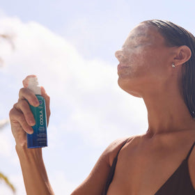 COOLA close-up label highlighting organic ingredients and reef compliance benefit