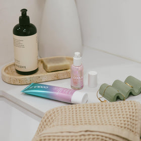 COOLA pump close-up emphasizing easy application and hygienic use