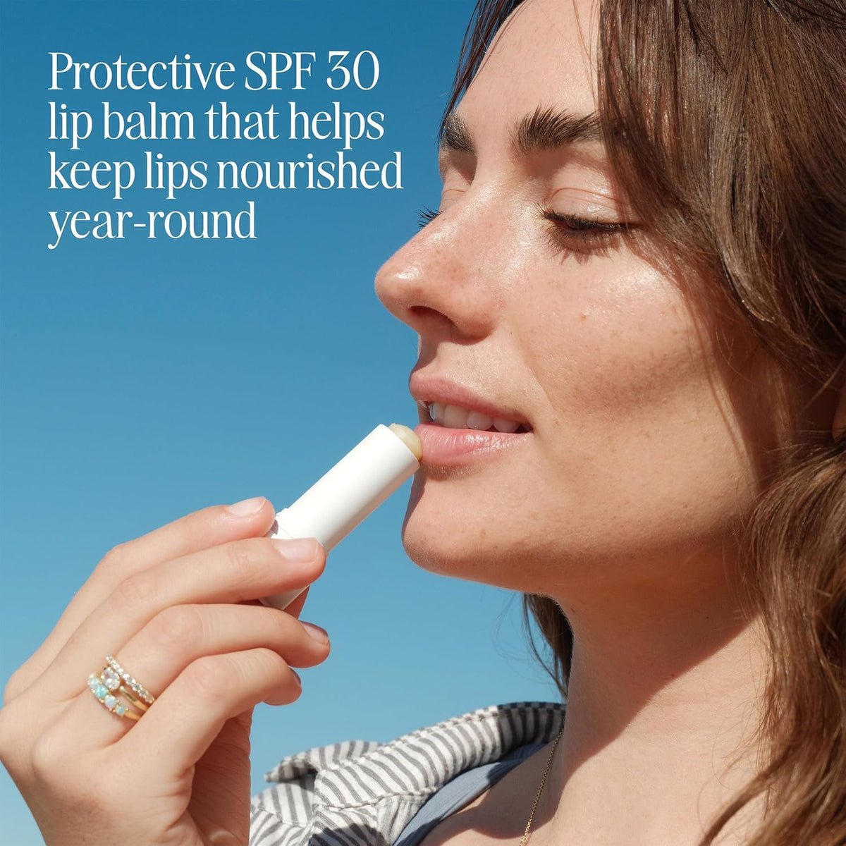 COOLA Liplux twist-up application demonstrating easy reapply on lips