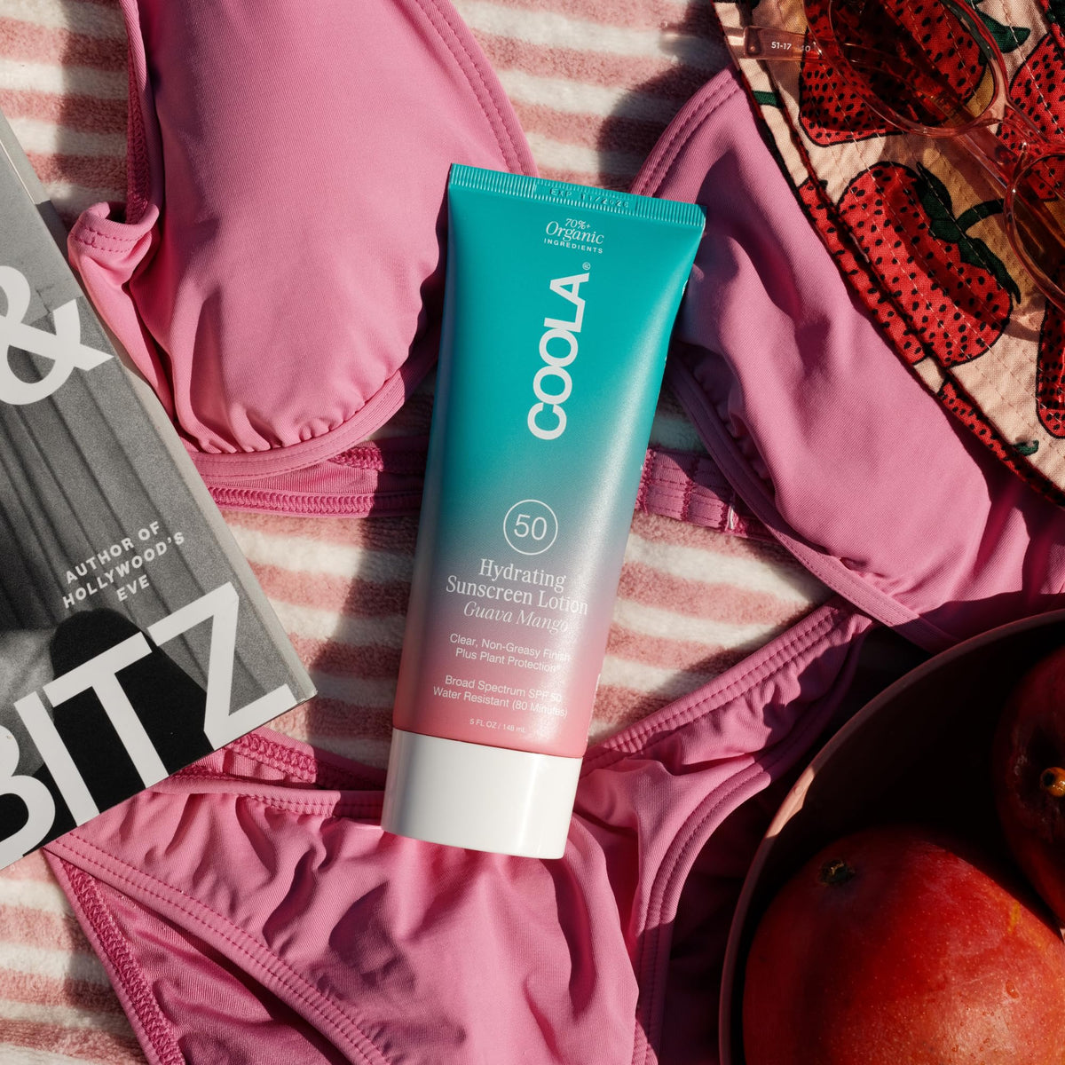 COOLA pump dispensing lotion showing controlled amount and mess-free use