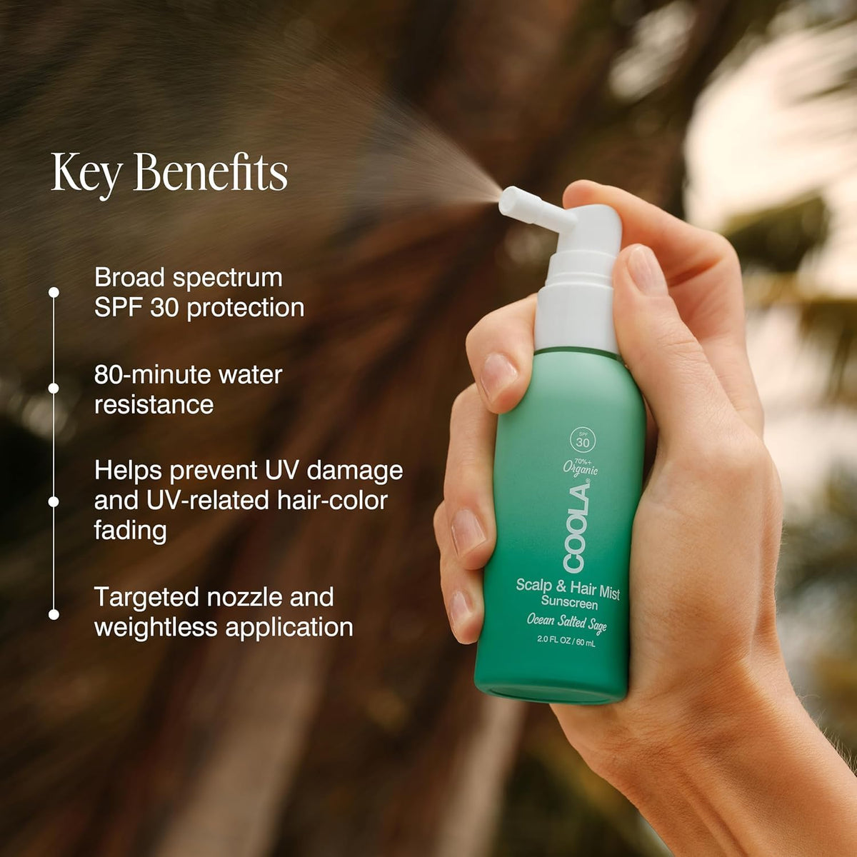 COOLA bottle beside sunglasses illustrating 2 fl oz travel-friendly sun protection