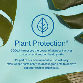 COOLA bottle held in hand to show size and portability benefit