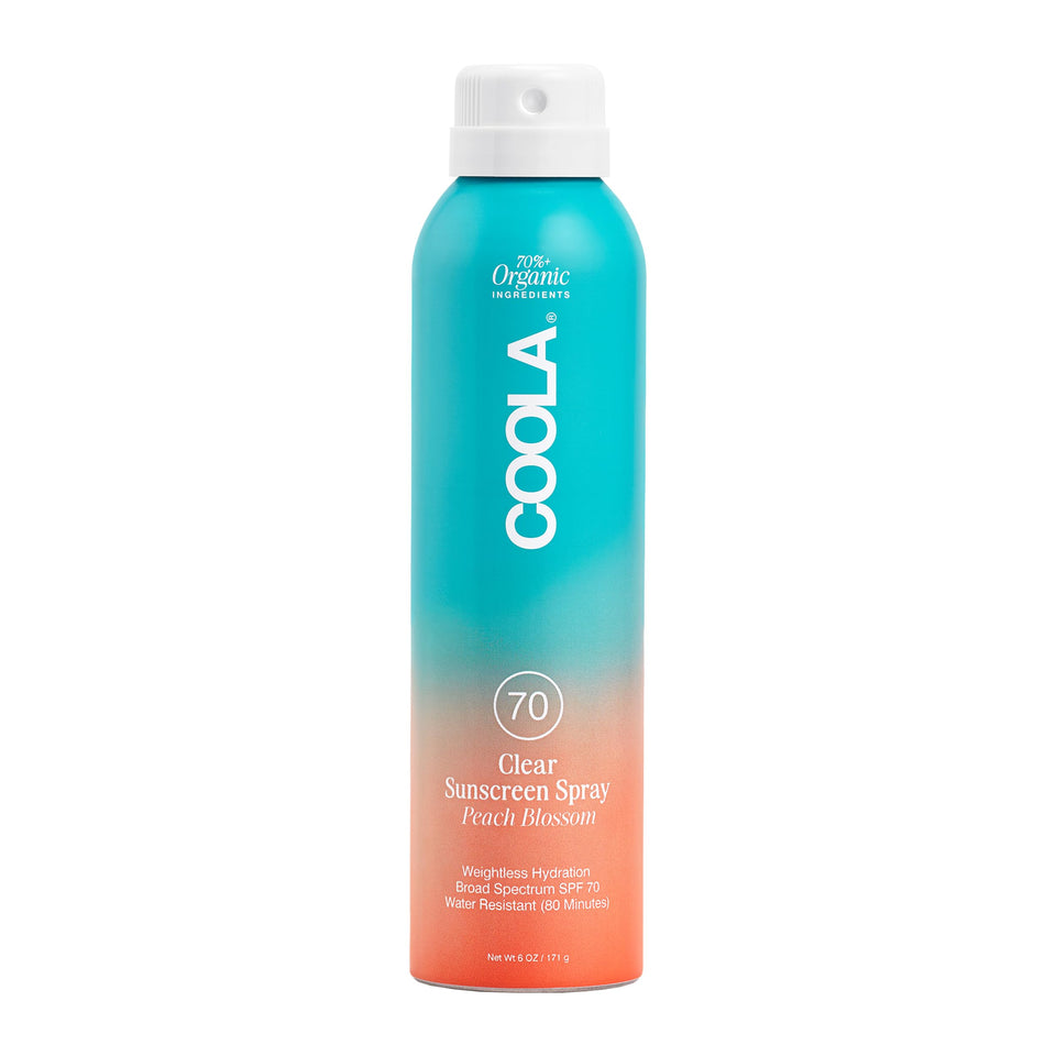 COOLA spray front packaging showing SPF 70 and peach blossom scent for travel convenience