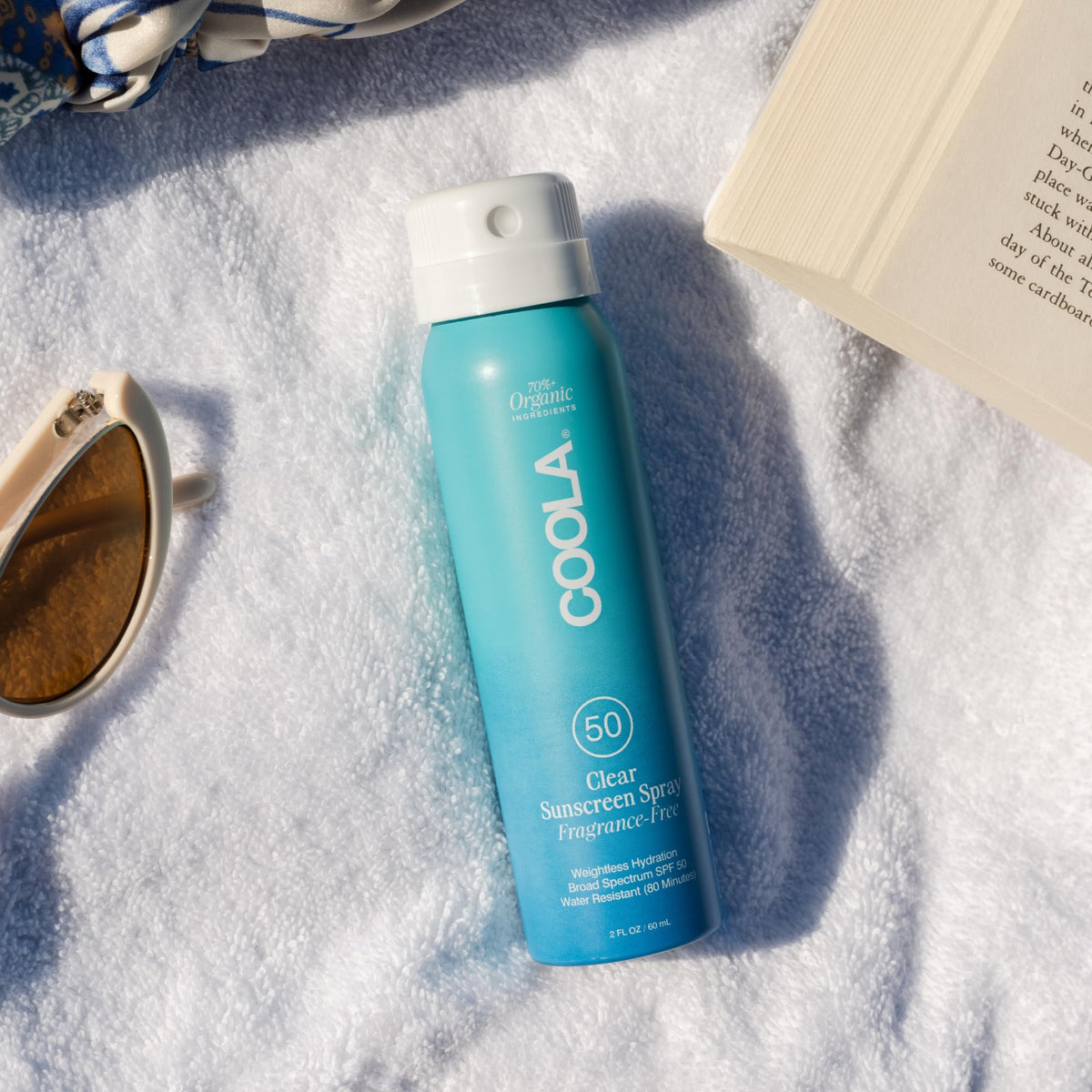 COOLA spray texture close-up highlighting fast absorption benefit