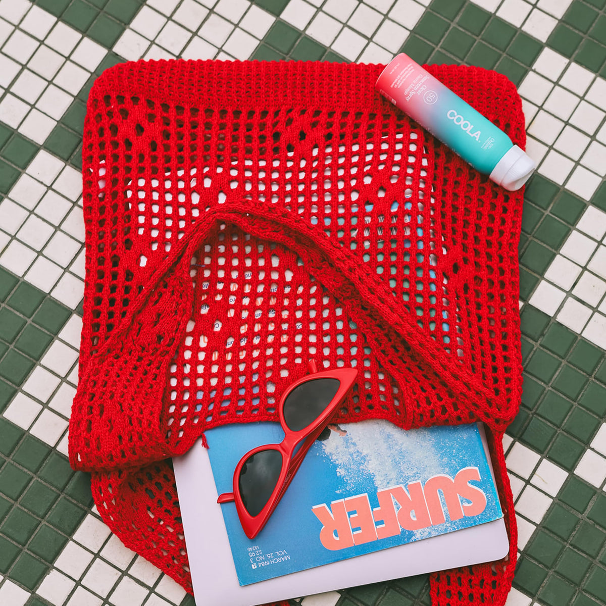 COOLA fine mist spray texture demonstrating quick-absorbing, non-greasy finish