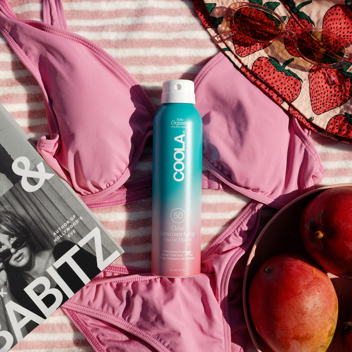 COOLA spray texture on skin showing lightweight absorbency and non-greasy finish benefit