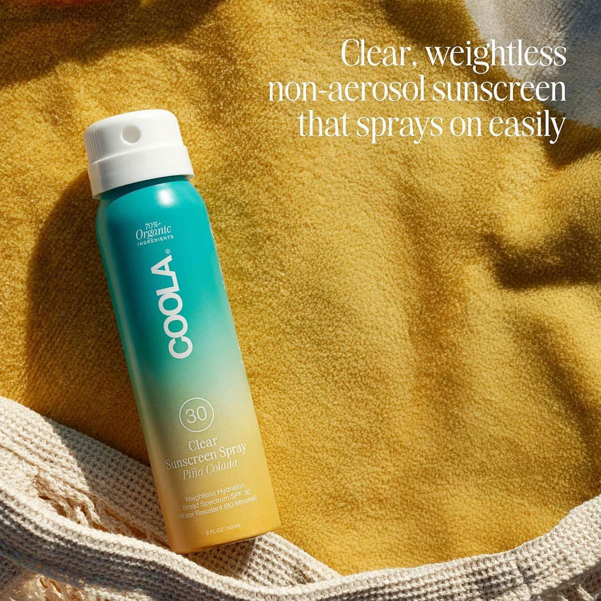 COOLA bottles packed in a travel pouch illustrating portability and organization